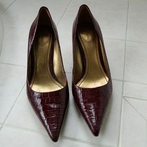 Burgundy faux patent leather heels. Nine West